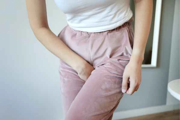 woman struggling with urine incontinence West Mersea